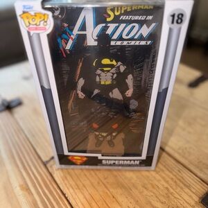 Funko Superman Pop Figure with Black and Yellow Suit
